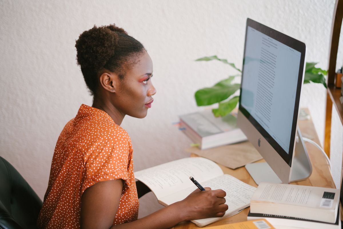 Author working on a self-publishing project at a desk